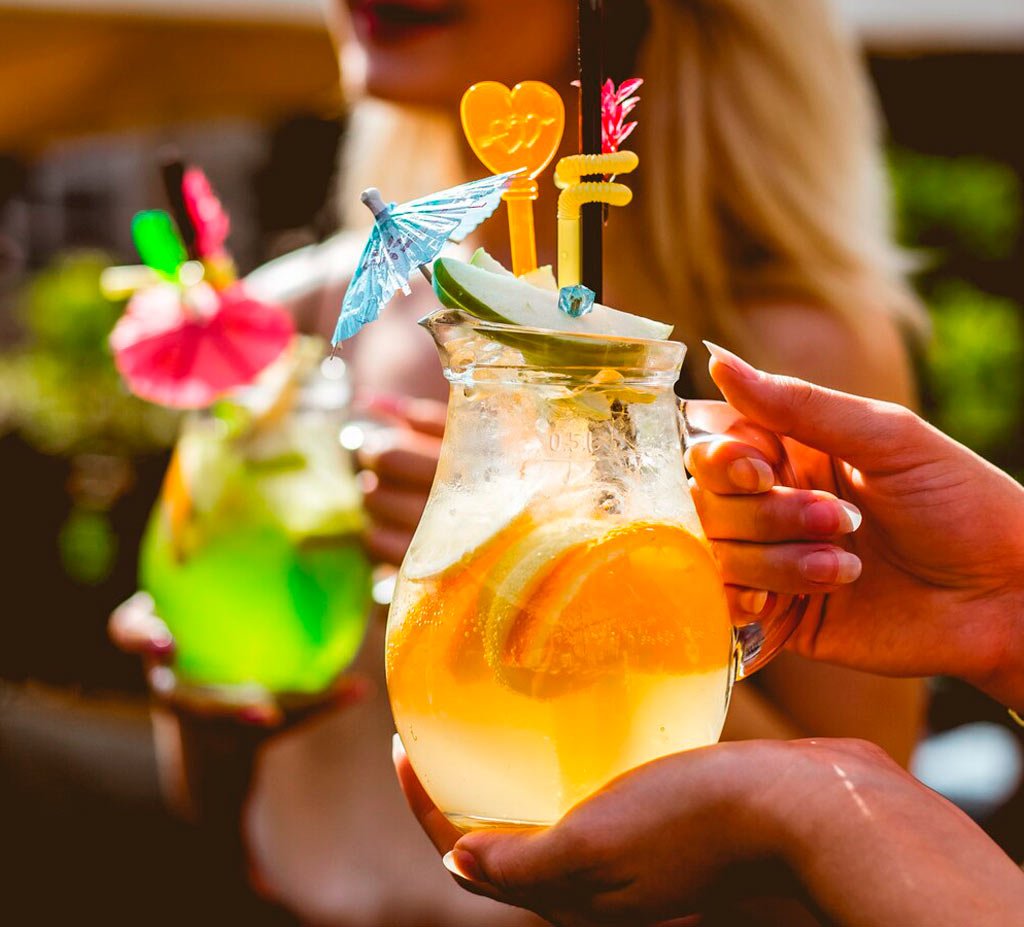Inclusive and refreshing mocktails served from a decorated mobile cart at a birthday